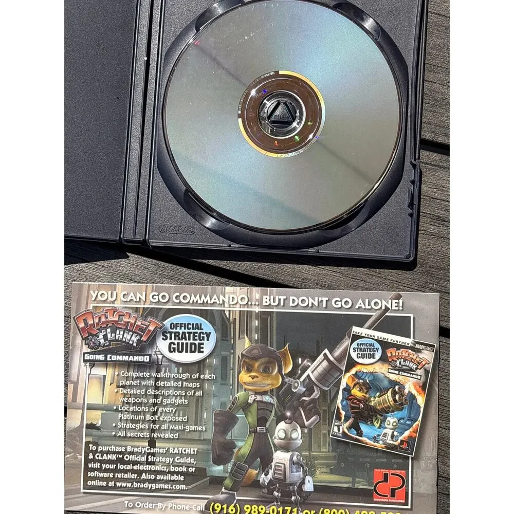 Ratchet & Clank: Going Commando PS2, 2003 Manual with sleeve Included. Full CIB.